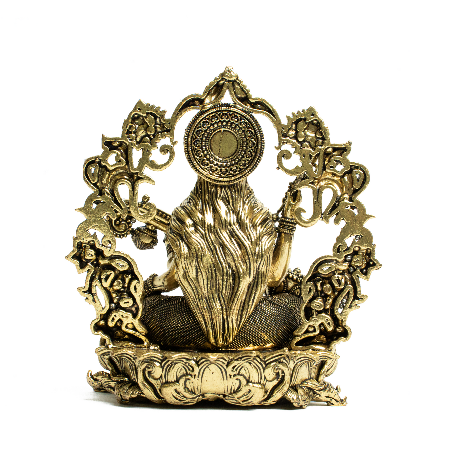 Brass Saraswati on Sofa