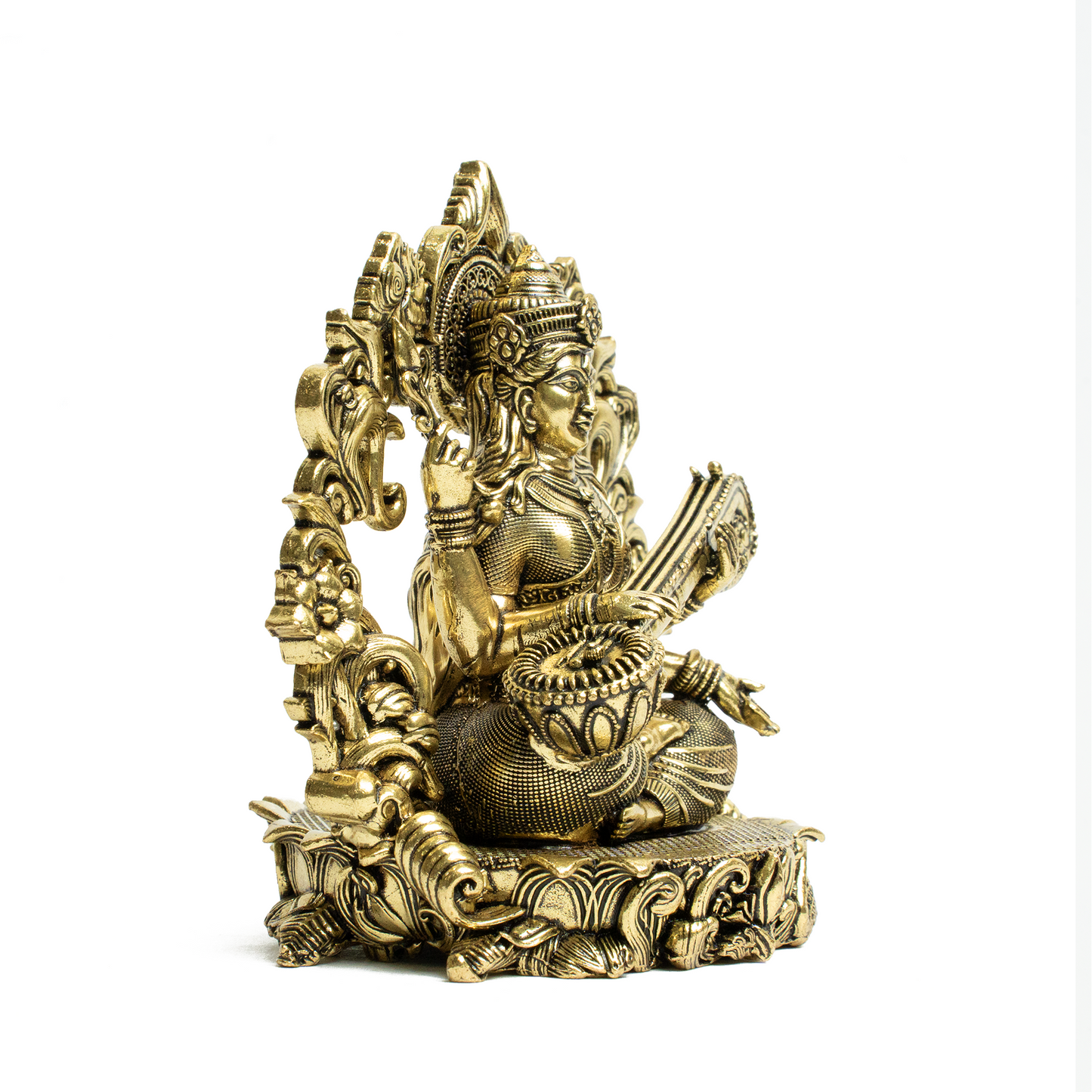 Brass Saraswati on Sofa