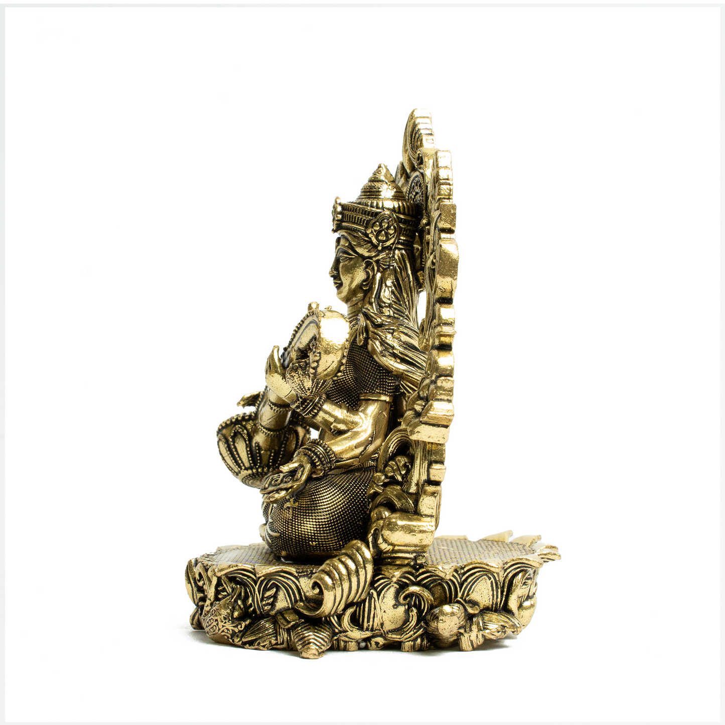 Brass Saraswati on Sofa